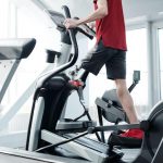 Guy Riding an Elliptical