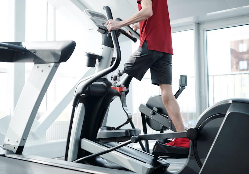 Guy Riding an Elliptical